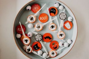 tray of halloween candies and cookies looking festive