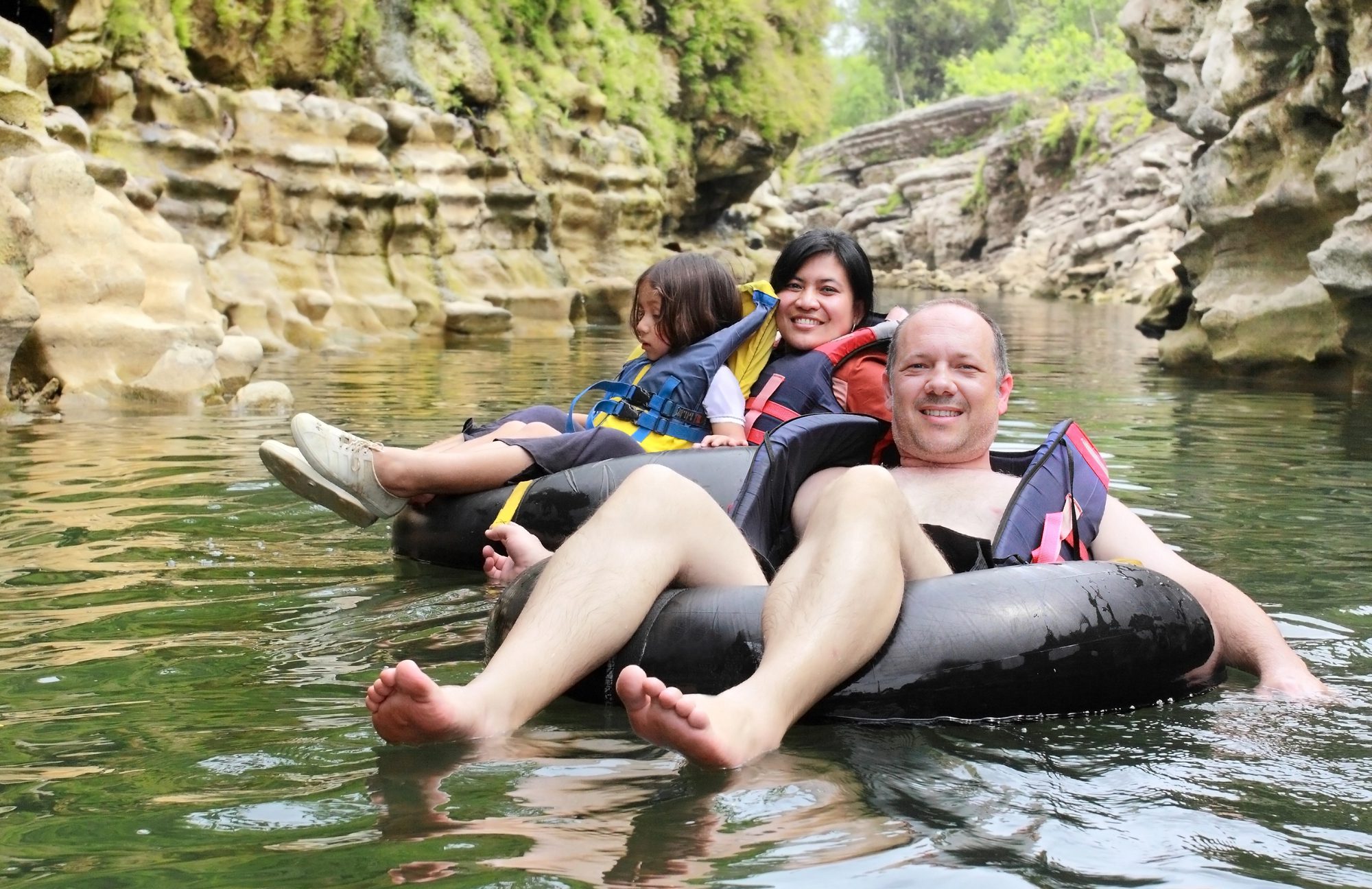 Family on a inflatable tube