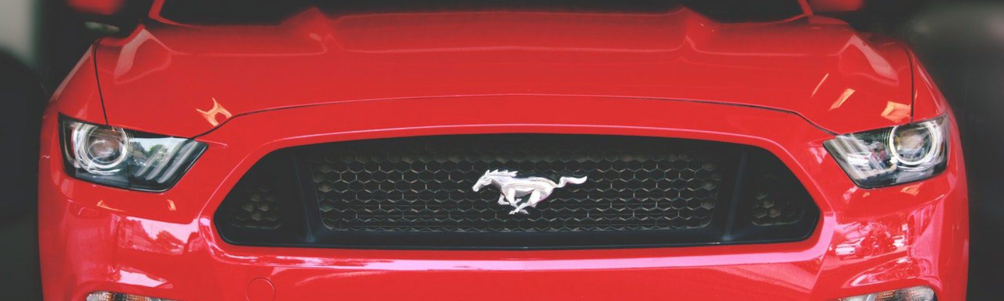 front view of red ford mustang